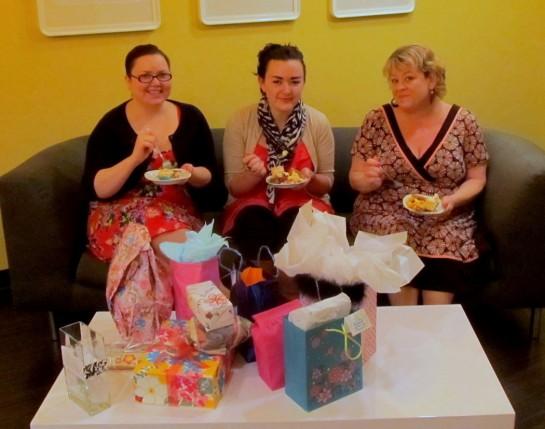 Amanda, Jennifer, and Sara Lee checking our the gift exchange