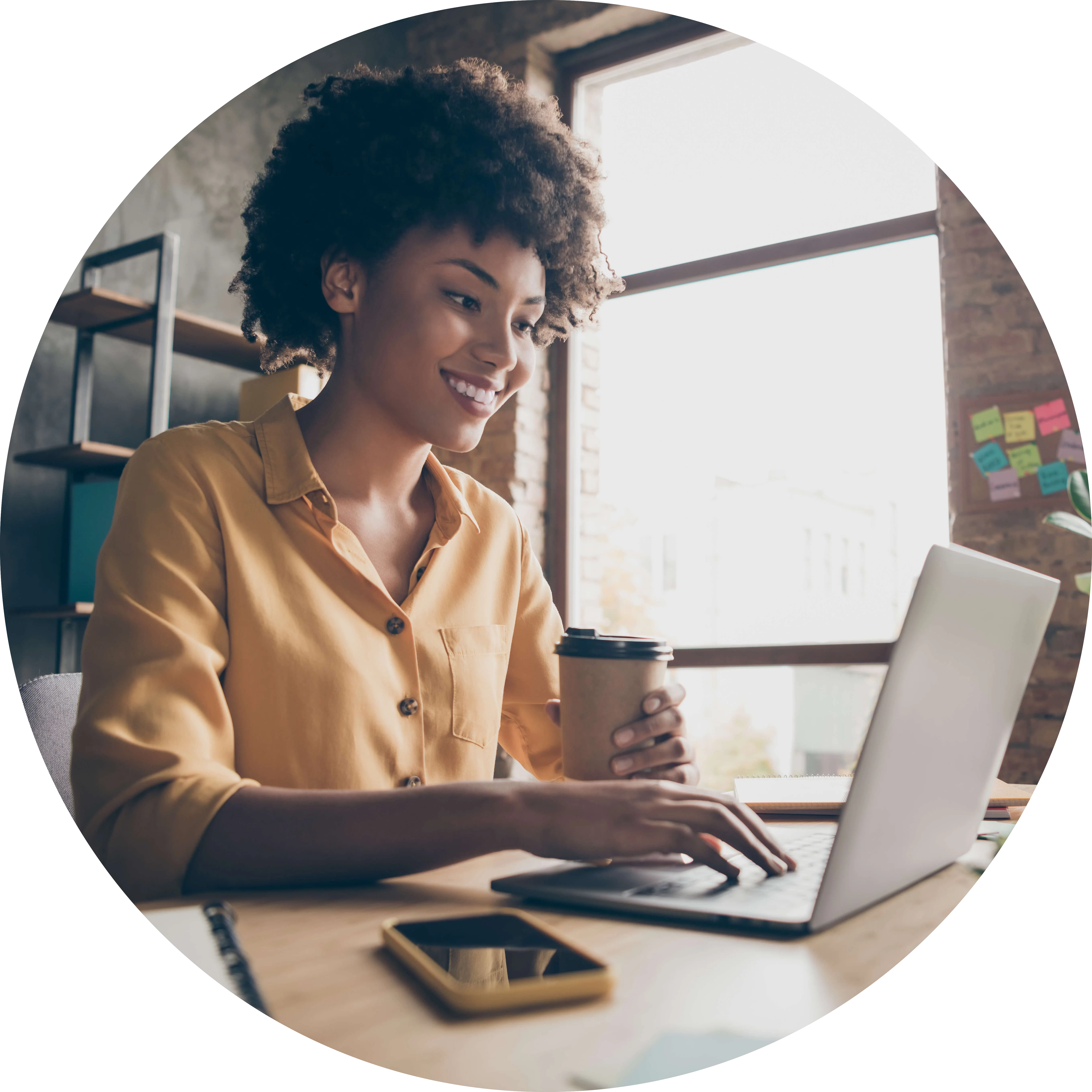 Woman smiling at computer