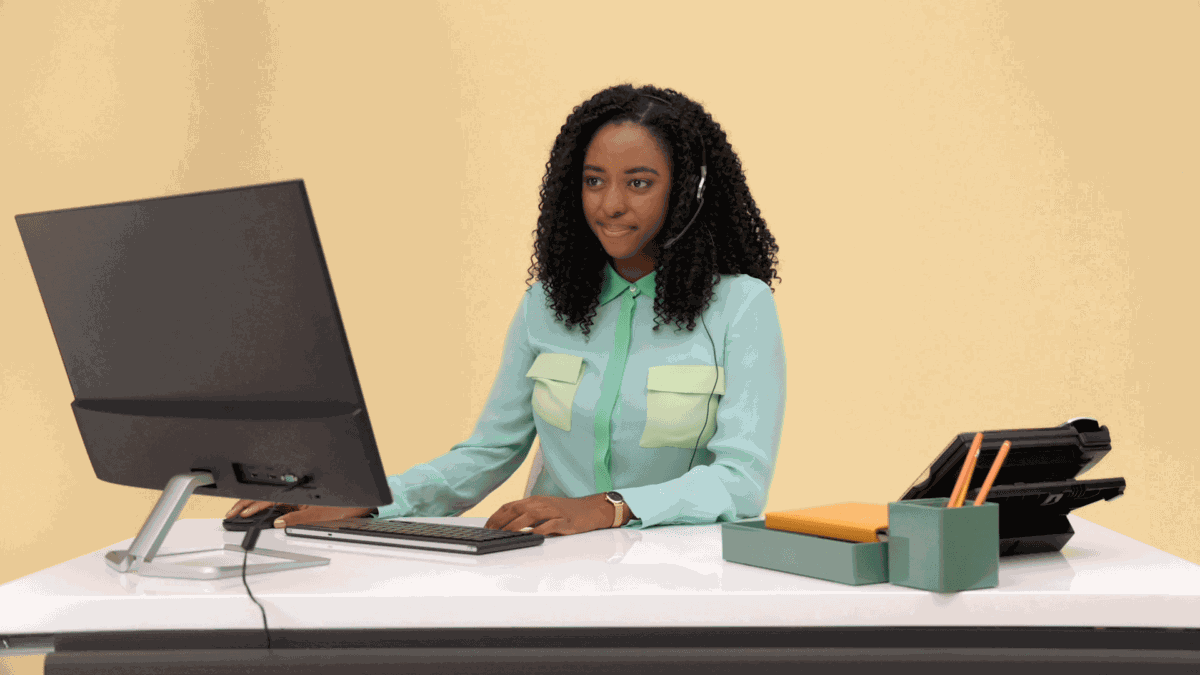Virtual receptionist sitting at desk