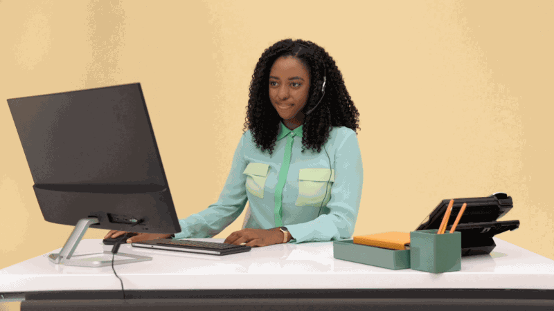 Virtual receptionist sitting at desk