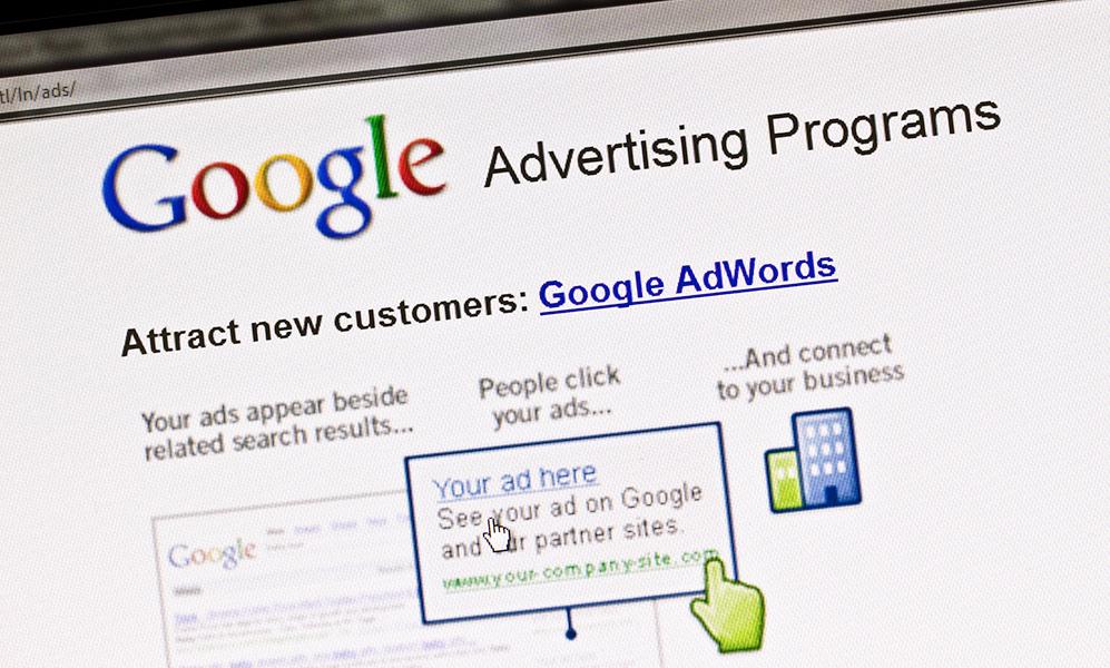 Closeup of Google Advertising Programs with text: Google Advertising Programs | Attract New Customers: Google AdWords
