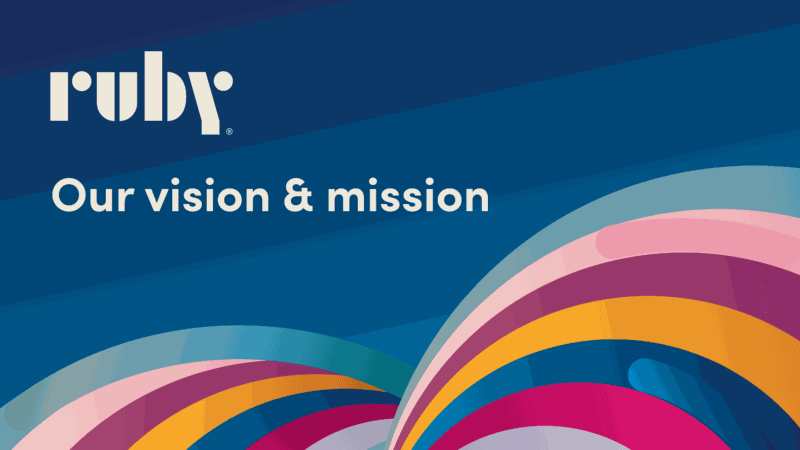 Multicolored waves on a dark blue background with text: Ruby our vision & mission
