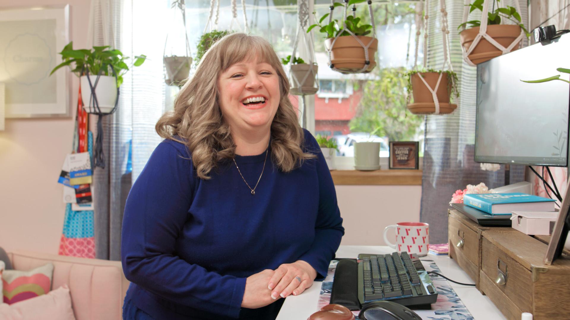 Ruby employee at desk