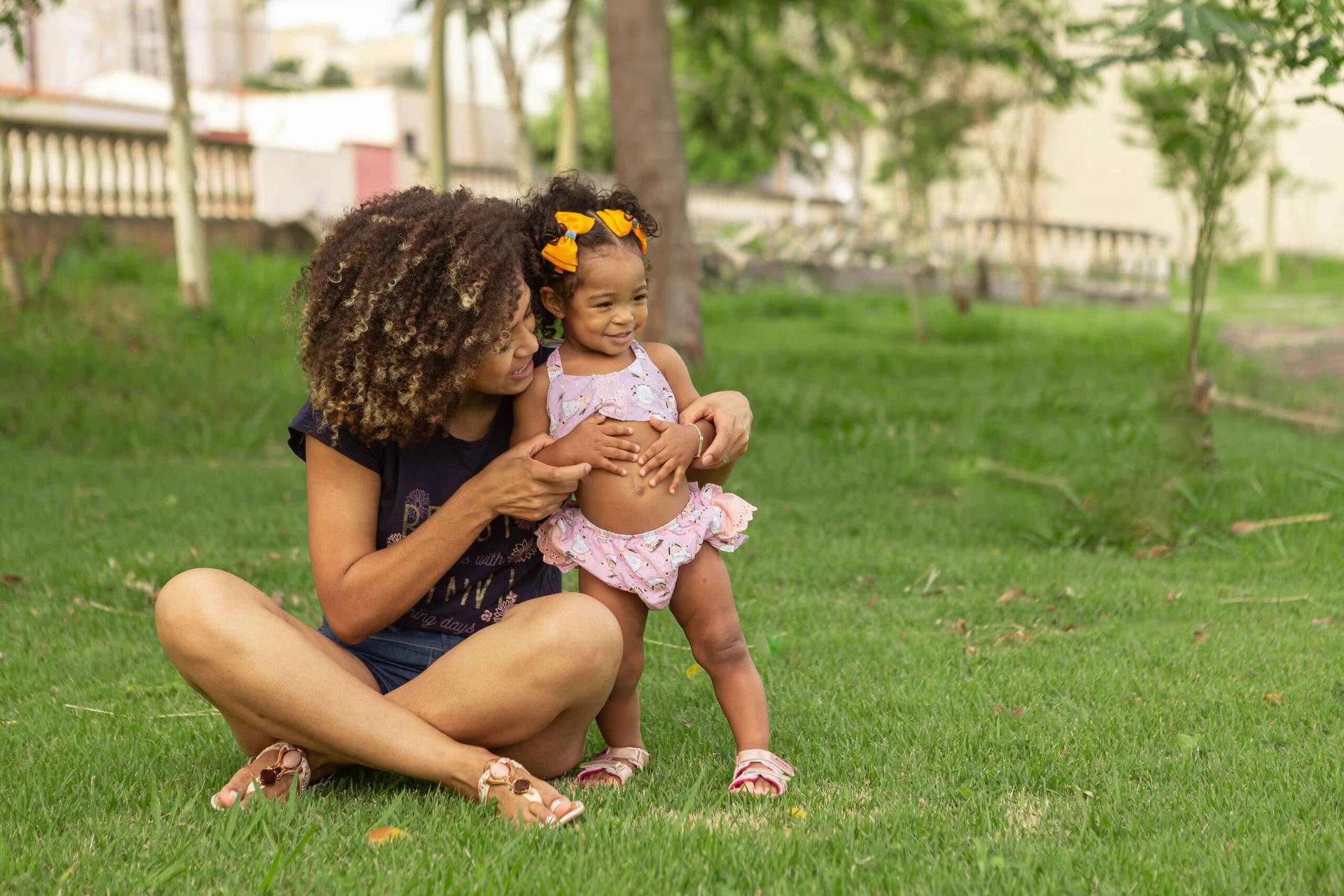 Woman with her child in nature