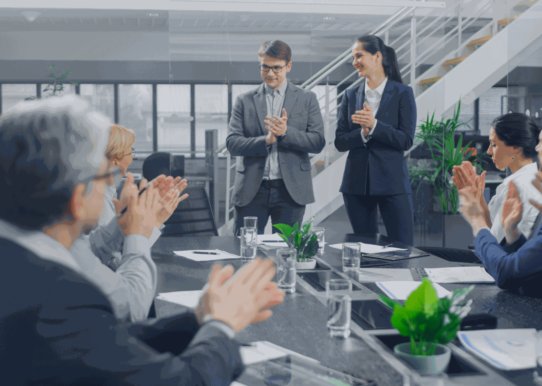 Business team applauding together