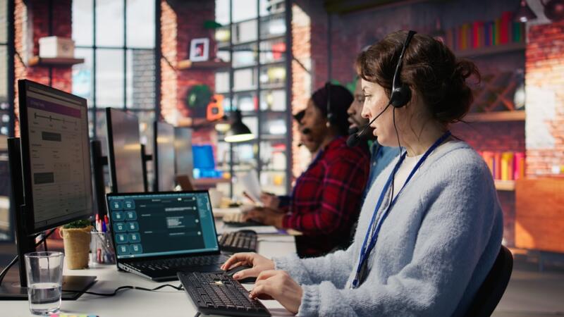 group of virtual receptionists in contemporary open concept office space