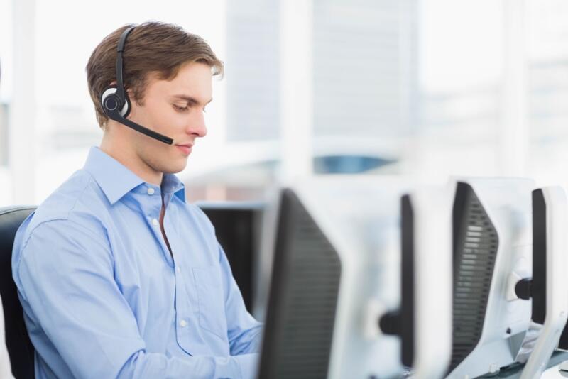 male customer service virtual receptionist in a blue button up shirt